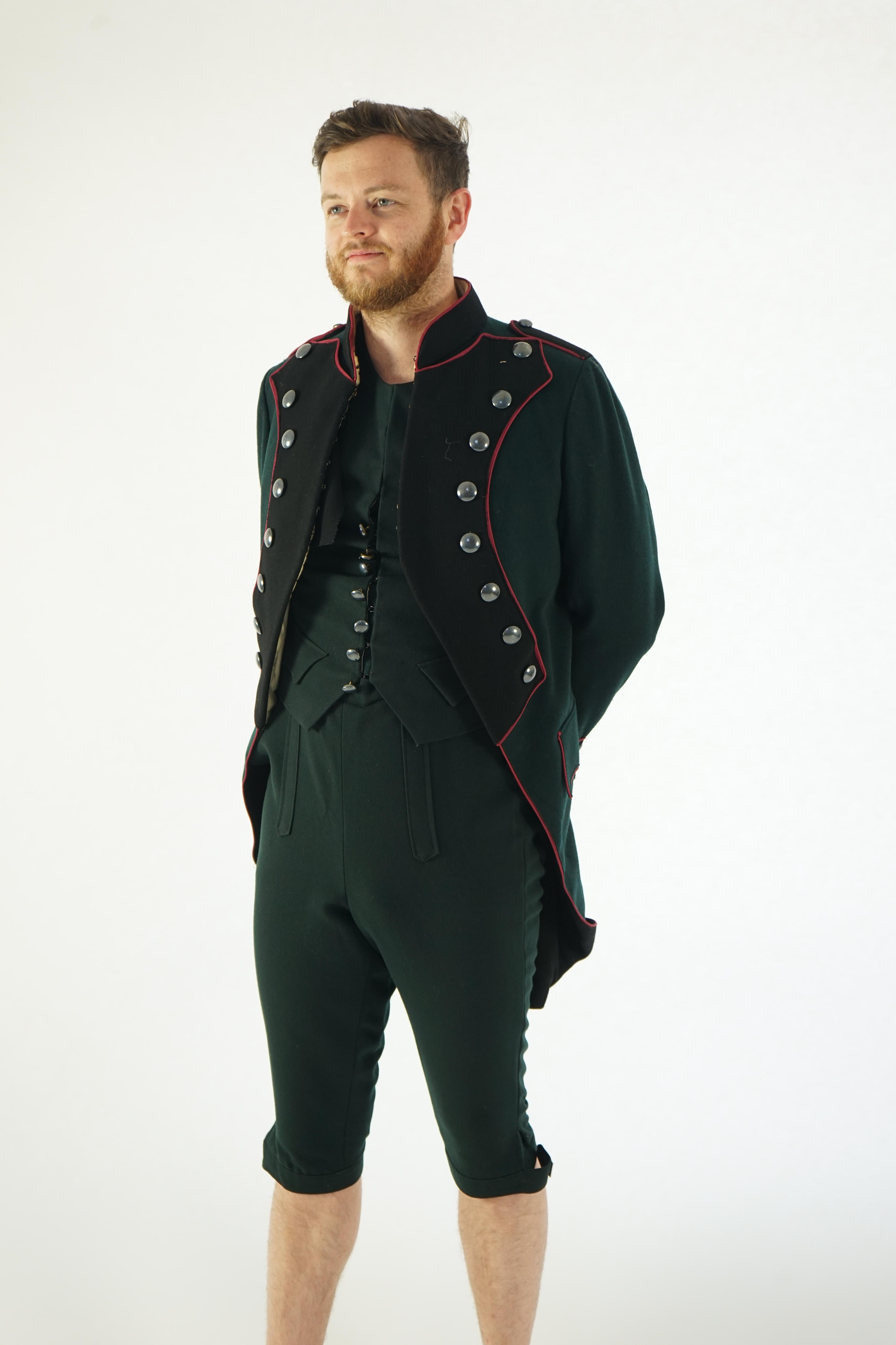 A dark green and black 18th Century style military uniform (jacket, waistcoat and breeches). Ex Royal Opera House - Soldier 'The Barber of Seville' 1993